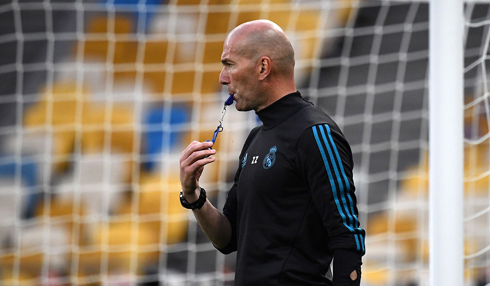 Real Madrid's French coach Zinedine Zidane takes in a Real Madrid team training session at the Olympic Stadium in Kiev, Ukraine on May 25, 2018, on the eve of the UEFA Champions League final football match between Liverpool and Real Madrid. (Photo by Franck FIFE / AFP) (Photo credit should read FRANCK FIFE/AFP/Getty Images)