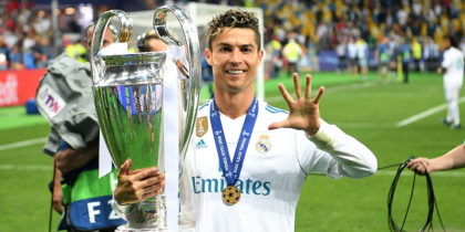 KIEV, UKRAINE - MAY 26: Cristiano Ronaldo of Real Madrid lifts The UEFA Champions League trophy following his sides victory in during the UEFA Champions League Final between Real Madrid and Liverpool at NSC Olimpiyskiy Stadium on May 26, 2018 in Kiev, Ukraine. (Photo by Michael Regan/Getty Images)