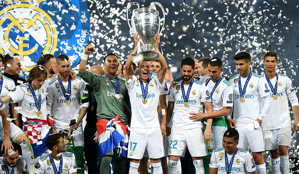 KIEV, UKRAINE - MAY 26: Lucas Vazquez of Real Madrid lifts The UEFA Champions League trophy following their sides victory in the UEFA Champions League Final between Real Madrid and Liverpool at NSC Olimpiyskiy Stadium on May 26, 2018 in Kiev, Ukraine. (Photo by Shaun Botterill/Getty Images)