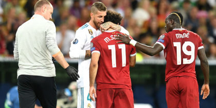 KIEV, UKRAINE - MAY 26: Sergio Ramos of Real Madrid consoles Mohamed Salah of Liverpool as he leaves the pitch injured during the UEFA Champions League Final between Real Madrid and Liverpool at NSC Olimpiyskiy Stadium on May 26, 2018 in Kiev, Ukraine. (Photo by Michael Regan/Getty Images)