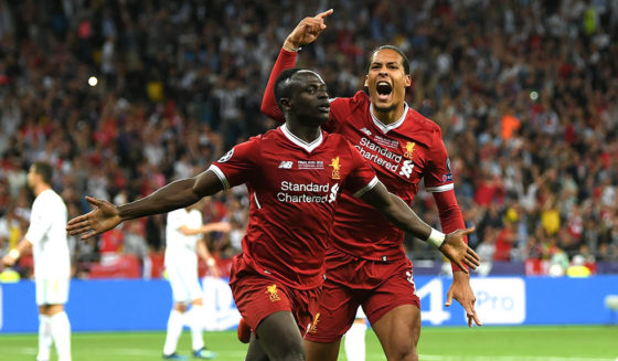 KIEV, UKRAINE - MAY 26: Sadio Mane of Liverpool celebrates after scoring his sides first goal with Virgil van Dijk of Liverpool during the UEFA Champions League Final between Real Madrid and Liverpool at NSC Olimpiyskiy Stadium on May 26, 2018 in Kiev, Ukraine. (Photo by Shaun Botterill/Getty Images)