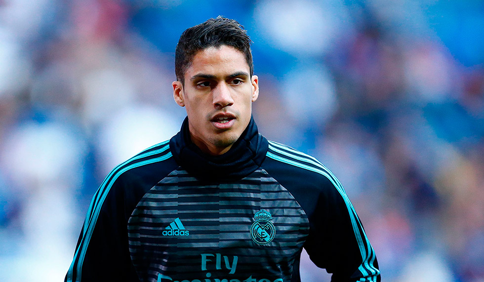 Real Madrid's French defender Raphael Varane warms up before the Spanish league football match between Real Madrid and Celta Vigo at the Santiago Bernabeu Stadium in Madrid on May 12, 2018. (Photo by Benjamin CREMEL / AFP) (Photo credit should read BENJAMIN CREMEL/AFP/Getty Images)