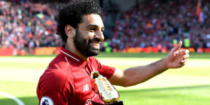 LIVERPOOL, ENGLAND - MAY 13: Mohamed Salah of Liverpool pose for a photo with his Premier League Golden Boot Award after the Premier League match between Liverpool and Brighton and Hove Albion at Anfield on May 13, 2018 in Liverpool, England. (Photo by Michael Regan/Getty Images)