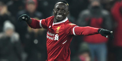 LIVERPOOL, ENGLAND - MARCH 03: Sadio Mane of Liverpool celebrates after scoring his sides second goal during the Premier League match between Liverpool and Newcastle United at Anfield on March 3, 2018 in Liverpool, England. (Photo by Gareth Copley/Getty Images)