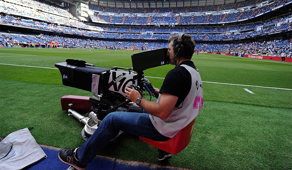 A camera operator films the La Liga match warm-up prior to the La Liga match between Real Madrid CF and Valencia CF at the estadio Santiago Bernabeu on May 9, 2015 in Madrid, Spain. The players union have called an indefinate strike on May 16th over disagreements on how revenue from a proposed new law will be divided amongst top teams and lower leagues in Spain. (Photo by Denis Doyle/Getty Images)