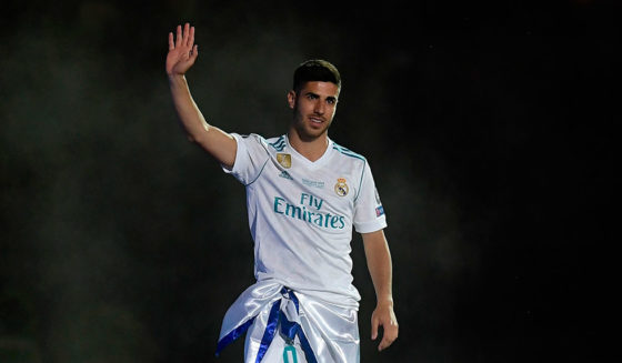 Real Madrid's Spanish midfielder Marco Asensio arrives at the Santiago Bernabeu stadium in Madrid on May 27, 2018 during a victory ceremony after Real Madrid won its third Champions League title in a row in Kiev. (Photo by OSCAR DEL POZO / AFP) (Photo credit should read OSCAR DEL POZO/AFP/Getty Images)