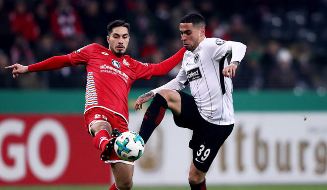 FRANKFURT AM MAIN, GERMANY - FEBRUARY 07: Omar Mascarell (R) of Frankfurt and Suat Serder of Mainz battle for the ball during the DFB Cup quarter final match between Eintracht Frankfurt and 1. FSV Mainz 05 at Commerzbank-Arena on February 7, 2018 in Frankfurt am Main, Germany. (Photo by Alex Grimm/Bongarts/Getty Images)