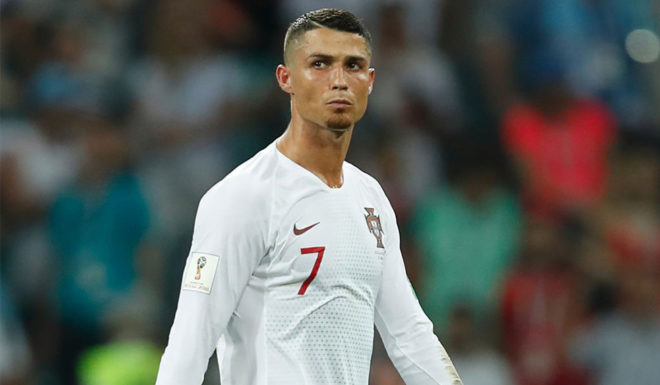 Portugal's forward Cristiano Ronaldo reacts to his teams loss during the Russia 2018 World Cup round of 16 football match between Uruguay and Portugal at the Fisht Stadium in Sochi on June 30, 2018. - Uruguay sent Cristiano Ronaldo and Portugal crashing out of the World Cup on Saturday as a pair of stunning goals from Edinson Cavani gave the South Americans a 2-1 victory. (Photo by Odd ANDERSEN / AFP) / RESTRICTED TO EDITORIAL USE - NO MOBILE PUSH ALERTS/DOWNLOADS (Photo credit should read ODD ANDERSEN/AFP/Getty Images)