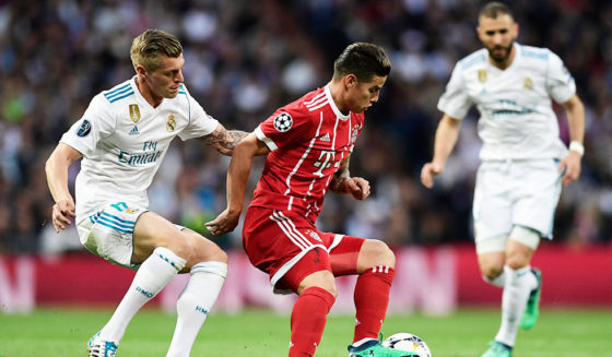 Bayern Munich's Colombian midfielder James Rodriguez (R) vies with Real Madrid's German midfielder Toni Kroos during the UEFA Champions League semi-final second leg football match between Real Madrid and Bayern Munich at the Santiago Bernabeu Stadium in Madrid on May 1, 2018. (Photo by JAVIER SORIANO / AFP) (Photo credit should read JAVIER SORIANO/AFP/Getty Images)