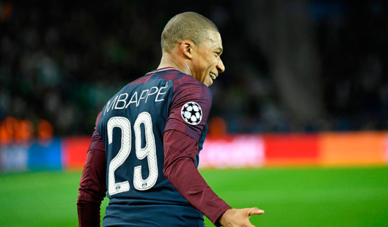Paris Saint-Germain's French striker Kylian Mbappe celebrates scoring his team's fourth goal during the UEFA Champions League Group B football match between Paris Saint-Germain (PSG) and Glasgow Celtic at Parc des Princes Stadium in Paris on November 22, 2017. / AFP PHOTO / BERTRAND GUAY (Photo credit should read BERTRAND GUAY/AFP/Getty Images)