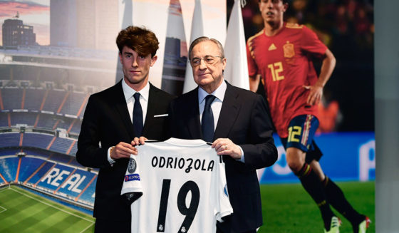 Real Madrid's president Florentino Perez (R) poses with Real Madrid's new defender Alvaro Odriozola during his official presentation at the Santiago Bernabeu stadium in Madrid on July 18, 2018. (Photo by PIERRE-PHILIPPE MARCOU / AFP) (Photo credit should read PIERRE-PHILIPPE MARCOU/AFP/Getty Images)