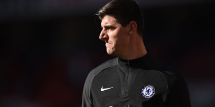 Chelsea's Belgian goalkeeper Thibaut Courtois warms up ahead of the English Premier League football match between Manchester United and Chelsea at Old Trafford in Manchester, north west England, on February 25, 2018. / AFP PHOTO / Oli SCARFF / RESTRICTED TO EDITORIAL USE. No use with unauthorized audio, video, data, fixture lists, club/league logos or 'live' services. Online in-match use limited to 75 images, no video emulation. No use in betting, games or single club/league/player publications. / (Photo credit should read OLI SCARFF/AFP/Getty Images)