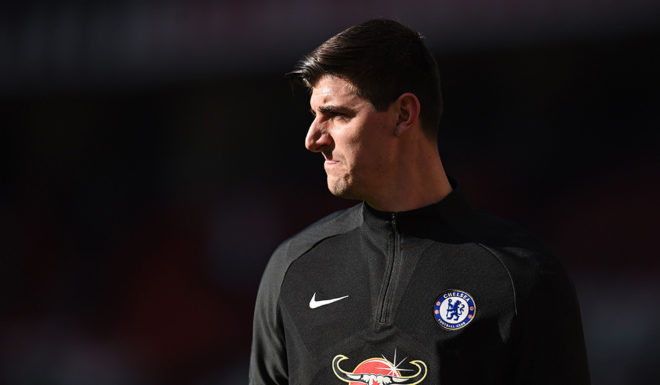 Chelsea's Belgian goalkeeper Thibaut Courtois warms up ahead of the English Premier League football match between Manchester United and Chelsea at Old Trafford in Manchester, north west England, on February 25, 2018. / AFP PHOTO / Oli SCARFF / RESTRICTED TO EDITORIAL USE. No use with unauthorized audio, video, data, fixture lists, club/league logos or 'live' services. Online in-match use limited to 75 images, no video emulation. No use in betting, games or single club/league/player publications. / (Photo credit should read OLI SCARFF/AFP/Getty Images)