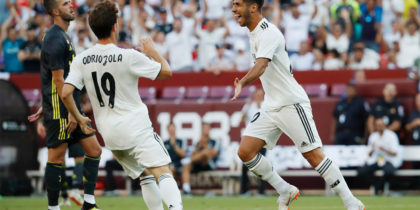 LANDOVER, MD - AUGUST 04: Marco Asensio #20 of Real Madrid celebrates after scoring a goal against Juventus in the second half during the International Champions Cup 2018 at FedExField on August 4, 2018 in Landover, Maryland. (Photo by Patrick McDermott/Getty Images)