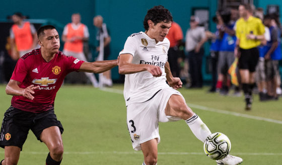 MIAMI, FL - JULY 31: Jesus Vallejo #3 of Real Madrid plays the ball past Alexis Sanchez #7 of Manchester United during the International Champions Cup match at Hard Rock Stadium on July 31, 2018 in Miami, Florida. (Photo by Rob Foldy/Getty Images)
