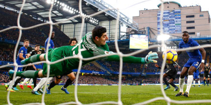 LONDON, ENGLAND - JANUARY 13: Thibaut Courtois of Chelsea dives to make a save during the Premier League match between Chelsea and Leicester City at Stamford Bridge on January 13, 2018 in London, England. (Photo by Clive Rose/Getty Images)