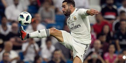 Real Madrid's Spanish defender Dani Carvajal controls the ball during the Santiago Bernabeu Trophy football match between Real Madrid and AC Milan in Madrid on August 11, 2018. (Photo by GABRIEL BOUYS / AFP) (Photo credit should read GABRIEL BOUYS/AFP/Getty Images)
