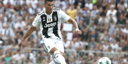 Juventus' forward from Portugal Cristiano Ronaldo scores a goal during the friendly football match between Juventus A and Juventus B at Villar Perosa, on August 12, 2018 at Villar Perosa. (Photo by Isabella Bonotto / AFP) (Photo credit should read ISABELLA BONOTTO/AFP/Getty Images)