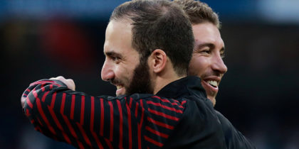MADRID, SPAIN - AUGUST 11: Gonzalo Higuain (L) of AC Milan hugs Sergio Ramos (R) of Real Madrid CF prior to start the Santiago Bernabeu Trophy between Real Madrid CF and AC Milan at Estadio Santiago Bernabeu on August 11, 2018 in Madrid, Spain. (Photo by Gonzalo Arroyo Moreno/Getty Images)
