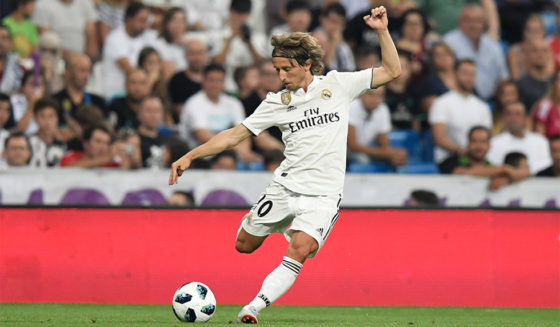 Real Madrid's Croatian midfielder Luka Modric prepares to kick the ball during the Santiago Bernabeu Trophy football match between Real Madrid and AC Milan in Madrid on August 11, 2018. (Photo by GABRIEL BOUYS / AFP) (Photo credit should read GABRIEL BOUYS/AFP/Getty Images)
