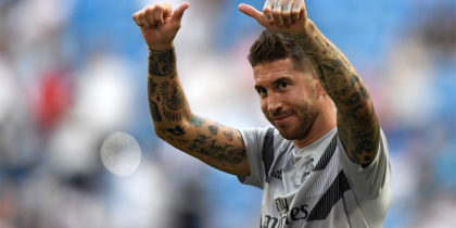 Real Madrid's Spanish defender Sergio Ramos salutes fans before the Santiago Bernabeu Trophy football match between Real Madrid and AC Milan in Madrid on August 11, 2018. (Photo by GABRIEL BOUYS / AFP) (Photo credit should read GABRIEL BOUYS/AFP/Getty Images)