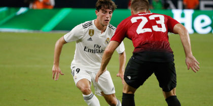 Real Madrid's Spanish defender Alvaro Odriozola (L) controls the ball around Manchester United's British defender Luke Shaw (R) during their International Champions Cup friendly match at Hard Rock Stadium in Miami, Florida, on July 31, 2018. (Photo by RHONA WISE / AFP) (Photo credit should read RHONA WISE/AFP/Getty Images)