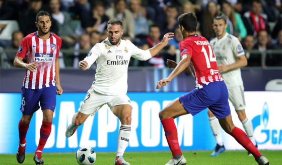 TALLINN, ESTONIA - AUGUST 15: Daniel Carvajal of Real Madrid is closed down by Rodri of Atletico Madrid during the UEFA Super Cup between Real Madrid and Atletico Madrid at Lillekula Stadium on August 15, 2018 in Tallinn, Estonia. (Photo by Alexander Hassenstein/Getty Images)
