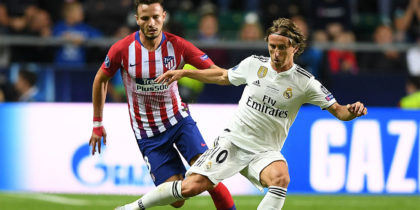 Real Madrid's Croatian midfielder Luka Modric (R) challenges Atletico Madrid's Spanish midfielder Saul Niguez during the UEFA Super Cup football match between Real Madrid and Atletico Madrid at the Lillekula Stadium in the Estonian capital Tallinn on August 15, 2018. (Photo by Janek SKARZYNSKI / AFP) (Photo credit should read JANEK SKARZYNSKI/AFP/Getty Images)