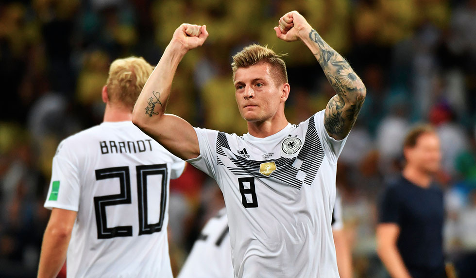 Germany's midfielder Toni Kroos celebrates scoring the 2-1 goal with his teammates during the Russia 2018 World Cup Group F football match between Germany and Sweden at the Fisht Stadium in Sochi on June 23, 2018. (Photo by Nelson Almeida / AFP) / RESTRICTED TO EDITORIAL USE - NO MOBILE PUSH ALERTS/DOWNLOADS (Photo credit should read NELSON ALMEIDA/AFP/Getty Images)