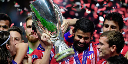Atletico Madrid's Spanish forward Diego Costa (C) holds the trophy as he celebrates with teammates at the end of the UEFA Super Cup football match between Real Madrid and Atletico Madrid at the Lillekula Stadium in the Estonian capital Tallinn on August 15, 2018. (Photo by JAVIER SORIANO / AFP) (Photo credit should read JAVIER SORIANO/AFP/Getty Images)