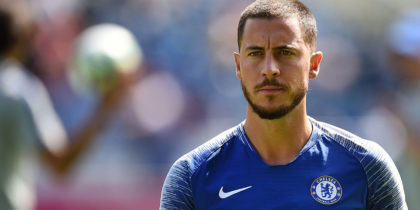 Chelsea's Belgian midfielder Eden Hazard warms up before the English Premier League football match between Huddersfield Town and Chelsea at the John Smith's stadium in Huddersfield, northern England on August 11, 2018. (Photo by Oli SCARFF / AFP) / RESTRICTED TO EDITORIAL USE.No use with unauthorized audio, video, data, fixture lists, club/league logos or 'live' services. Online in-match use limited to 120 images. An additional 40 images may be used in extra time. No video emulation. Social media in-match use limited to 120 images. An additional 40 images may be used in extra time. No use in betting publications, games or single club/league/player publications/ / (Photo credit should read OLI SCARFF/AFP/Getty Images)