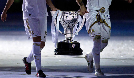 Real Madrid's players hold the Spanish L