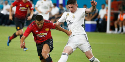 Manchester United's Chilean foward Alexis Sanchez (L) vies for the ball with Real Madrid's Uruguayan midfielder Federico Valverde (R) during their International Champions Cup friendly football match at Hard Rock Stadium in Miami, Florida, on July 31, 2018. (Photo by RHONA WISE / AFP) (Photo credit should read RHONA WISE/AFP/Getty Images)