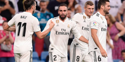 Real Madrid's Spanish defender Dani Carvajal (2ndL) celebrates with teammates after scoring a goal during the Spanish League football match between Real Madrid and Getafe at the Santiago Bernabeu stadium in Madrid on August 19, 2018. (Photo by JAVIER SORIANO / AFP) (Photo credit should read JAVIER SORIANO/AFP/Getty Images)