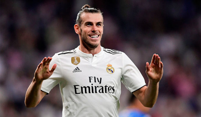 Real Madrid's Welsh forward Gareth Bale celebrates after scoring a goal during the Spanish League football match between Real Madrid and Getafe at the Santiago Bernabeu stadium in Madrid on August 19, 2018. (Photo by JAVIER SORIANO / AFP) (Photo credit should read JAVIER SORIANO/AFP/Getty Images)