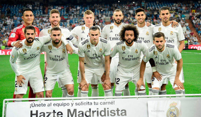 (Back L-R) Real Madrid's Costa Rican goalkeeper Keylor Navas, Real Madrid's Spanish defender Sergio Ramos, Real Madrid's German midfielder Toni Kroos, Real Madrid's French forward Karim Benzema, Real Madrid's Spanish midfielder Marco Asensio, Real Madrid's Spanish midfielder Daniel Ceballos, (L-R) Real Madrid's Spanish midfielder Isco, Real Madrid's Spanish defender Dani Carvajal, Real Madrid's Welsh forward Gareth Bale, Real Madrid's Brazilian defender Marcelo and Real Madrid's Spanish defender Nacho Fernandez pose for a group picture before the Spanish League football match between Real Madrid and Getafe at the Santiago Bernabeu stadium in Madrid on August 19, 2018. (Photo by JAVIER SORIANO / AFP) (Photo credit should read JAVIER SORIANO/AFP/Getty Images)