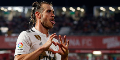 Real Madrid's Welsh forward Gareth Bale celebrates scoring his team's third goal during the Spanish league football match between Girona FC and Real Madrid CF at the Montilivi stadium in Girona on August 26, 2018. (Photo by Pau BARRENA CAPILLA / AFP) (Photo credit should read PAU BARRENA CAPILLA/AFP/Getty Images)