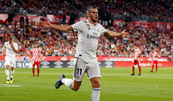 Real Madrid's Welsh forward Gareth Bale celebrates scoring his team's third goal during the Spanish league football match between Girona FC and Real Madrid CF at the Montilivi stadium in Girona on August 26, 2018. (Photo by Pau BARRENA CAPILLA / AFP) (Photo credit should read PAU BARRENA CAPILLA/AFP/Getty Images)