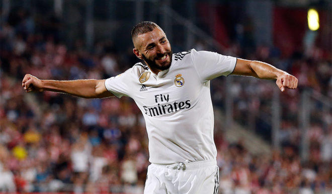Real Madrid's French forward Karim Benzema celebrates his second goal during the Spanish league football match between Girona FC and Real Madrid CF at the Montilivi stadium in Girona on August 26, 2018. (Photo by Pau BARRENA CAPILLA / AFP) (Photo credit should read PAU BARRENA CAPILLA/AFP/Getty Images)