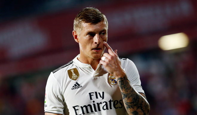 Real Madrid's German midfielder Toni Kroos gestures during the Spanish league football match between Girona FC and Real Madrid CF at the Montilivi stadium in Girona on August 26, 2018. (Photo by Pau BARRENA CAPILLA / AFP) (Photo credit should read PAU BARRENA CAPILLA/AFP/Getty Images)
