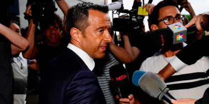 Footballing super-agent Jorge Mendes (C), surrounded by journalists, arrives at the Court in Pozuelo de Alarcon on June 27, 2017 to be questioned by Spanish judge as part of a probe into Colombian striker Radamel Falcao's alleged tax evasion. / AFP PHOTO / PIERRE-PHILIPPE MARCOU (Photo credit should read PIERRE-PHILIPPE MARCOU/AFP/Getty Images)