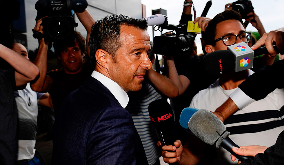 Footballing super-agent Jorge Mendes (C), surrounded by journalists, arrives at the Court in Pozuelo de Alarcon on June 27, 2017 to be questioned by Spanish judge as part of a probe into Colombian striker Radamel Falcao's alleged tax evasion. / AFP PHOTO / PIERRE-PHILIPPE MARCOU (Photo credit should read PIERRE-PHILIPPE MARCOU/AFP/Getty Images)