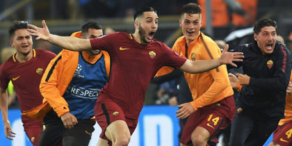 TOPSHOT - AS Roma's Greek defender Kostas Manolas (C) celebrates after scoring a goal during the UEFA Champions League quarter-final second leg football match between AS Roma and FC Barcelona at the Olympic Stadium in Rome on April 10, 2018. / AFP PHOTO / LLUIS GENE (Photo credit should read LLUIS GENE/AFP/Getty Images)