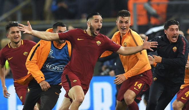 TOPSHOT - AS Roma's Greek defender Kostas Manolas (C) celebrates after scoring a goal during the UEFA Champions League quarter-final second leg football match between AS Roma and FC Barcelona at the Olympic Stadium in Rome on April 10, 2018. / AFP PHOTO / LLUIS GENE (Photo credit should read LLUIS GENE/AFP/Getty Images)