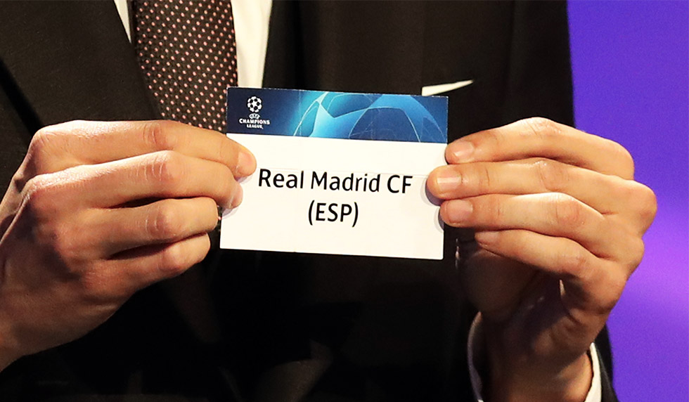 Brazilian former football player Kaka shows the name of Real Madrid during the draw for UEFA Champions League football tournament at The Grimaldi Forum in Monaco on August 30, 2018. (Photo by Valery HACHE / AFP) (Photo credit should read VALERY HACHE/AFP/Getty Images)