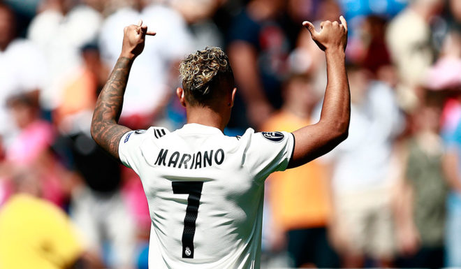 Real Madrid's Spanish-Dominican forward Mariano poses with his new number 7 jersey during his official presentation at the Santiago Bernabeu Stadium in Madrid on August 31, 2018. (Photo by BENJAMIN CREMEL / AFP) (Photo credit should read BENJAMIN CREMEL/AFP/Getty Images)