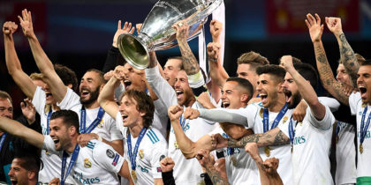 Real Madrid's players celebrate with the trophy after winning the UEFA Champions League final football match between Liverpool and Real Madrid at the Olympic Stadium in Kiev, Ukraine, on May 26, 2018. (Photo by FRANCK FIFE / AFP) (Photo credit should read FRANCK FIFE/AFP/Getty Images)