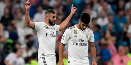 Real Madrid's French forward Karim Benzema (L) celebrates with Real Madrid's Spanish midfielder Marco Asensio after scoring a goal during the Spanish league football match between Real Madrid CF and Club Deportivo Leganes SAD at the Santiago Bernabeu stadium in Madrid on September 1, 2018. (Photo by GABRIEL BOUYS / AFP) (Photo credit should read GABRIEL BOUYS/AFP/Getty Images)
