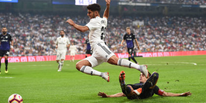 MADRID, SPAIN - SEPTEMBER 01: Marco Asensio of Real Madrid is fouled in the penalty area by Unai Bustinza of CD Leganes during the La Liga match between Real Madrid CF and CD Leganes at Estadio Santiago Bernabeu on September 1, 2018 in Madrid, Spain. Sergio Ramos converted the penalty for their 4th goal. (Photo by Denis Doyle/Getty Images)
