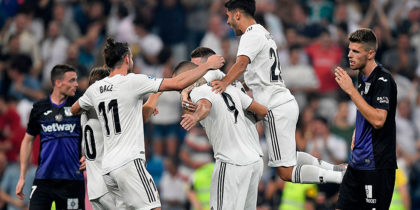 Real Madrid's players celebrate their second goal during the Spanish league football match between Real Madrid CF and Club Deportivo Leganes SAD at the Santiago Bernabeu stadium in Madrid on September 1, 2018. (Photo by GABRIEL BOUYS / AFP) (Photo credit should read GABRIEL BOUYS/AFP/Getty Images)